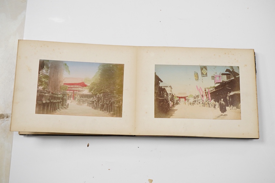 An early 20th century Japanese bone inlaid lacquer photograph album containing coloured photographs of people and Japanese scenes.19.5cm wide x 15.5cm high